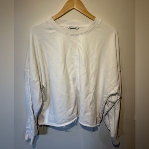 Cropped and distressed sweatshirt